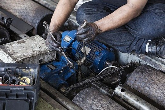 Pngtree hand of repairman holding a wrench and tighten and during maintenance photo image 3066200